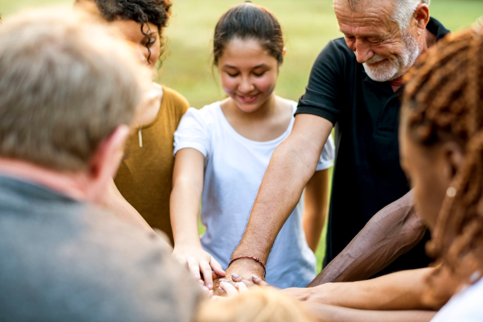 group of people holding hand assemble togetherness